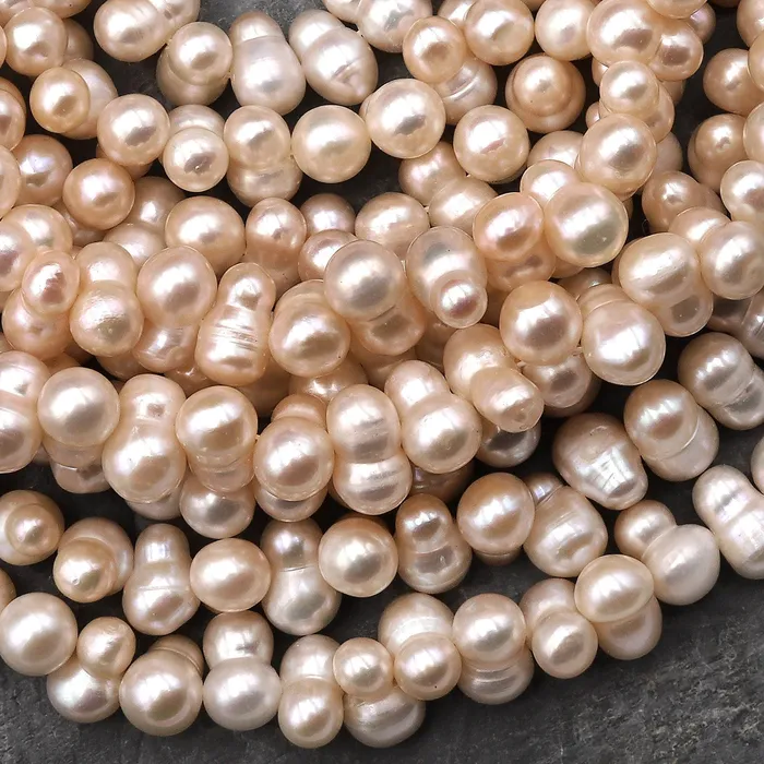 Genuine Soft Peach Freshwater Twin Baroque Pearl Center Drilled 155 Strand Intrinsic Trading Earrings Genuine Soft Peach Freshwater Twin Baroque Pearl Center Drilled 155 Strand Intrinsic Trading Earrings