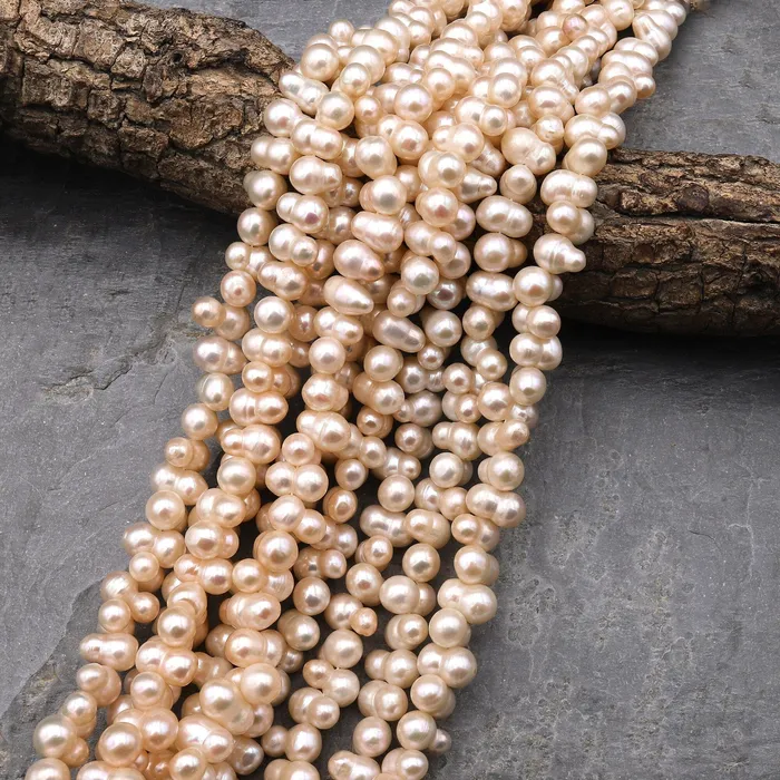 Genuine Soft Peach Freshwater Twin Baroque Pearl Center Drilled 155 Strand Intrinsic Trading Earrings