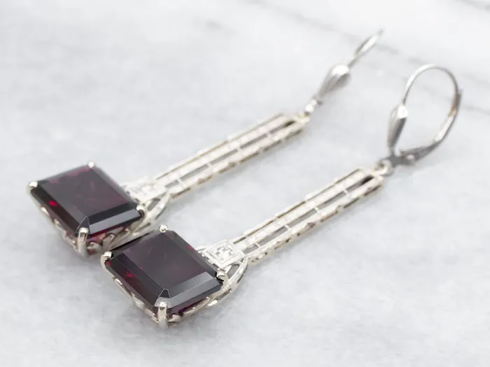 East to West Rhodolite Garnet and Diamond Drop Earrings Market Square Jewelers Earrings