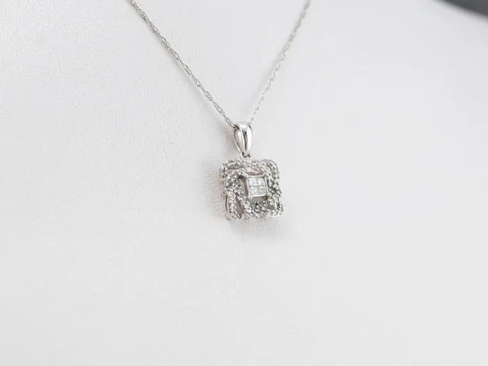 Market Square Jewelers Necklaces Twisting Diamond Halo Pendant