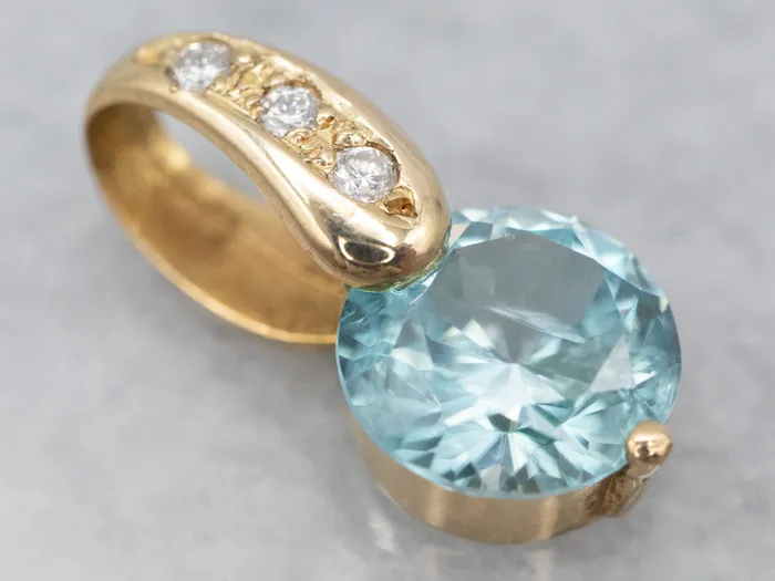 Market Square Jewelers Necklaces Yellow Gold Blue Zircon Pendant with Diamond Accents Market Square Jewelers Necklaces Yellow Gold Blue Zircon Pendant with Diamond Accents