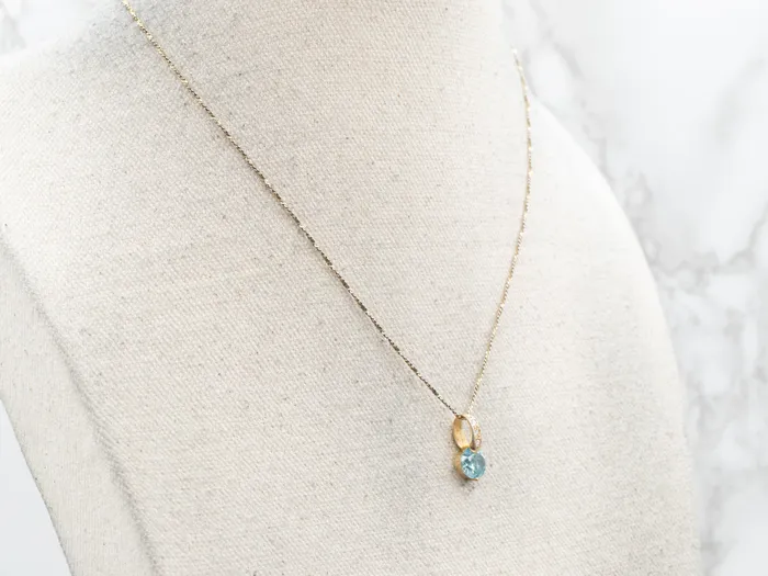 Market Square Jewelers Necklaces Yellow Gold Blue Zircon Pendant with Diamond Accents Market Square Jewelers Necklaces Yellow Gold Blue Zircon Pendant with Diamond Accents