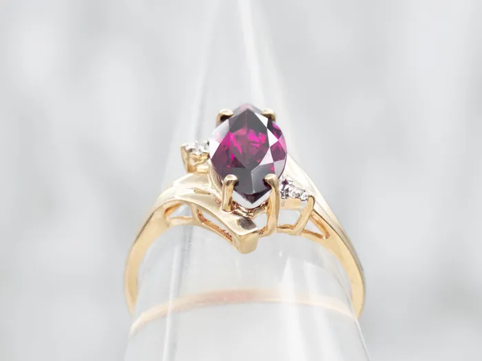 Rings Market Square Jewelers Yellow Gold Marquise Cut Rhodolite Garnet Bypass Ring with Diamond Accents Rings Market Square Jewelers Yellow Gold Marquise Cut Rhodolite Garnet Bypass Ring with Diamond Accents