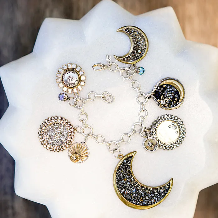 Waxing Poetic Made of Stars Spinner Pendant Necklaces